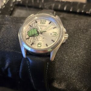 Citizen Eco-Drive Watch with Green Fist Design